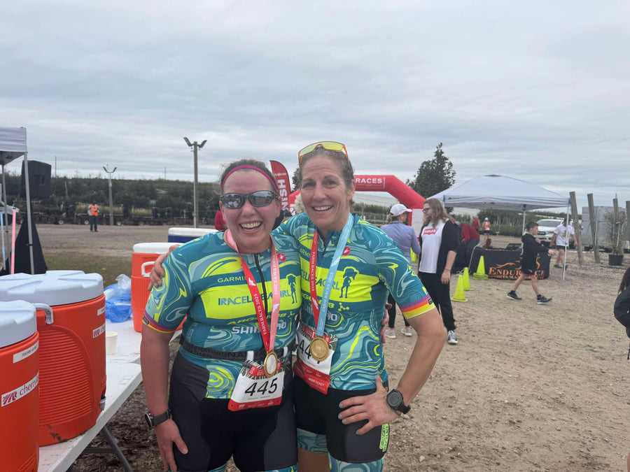 Teammates with medals at the finish
