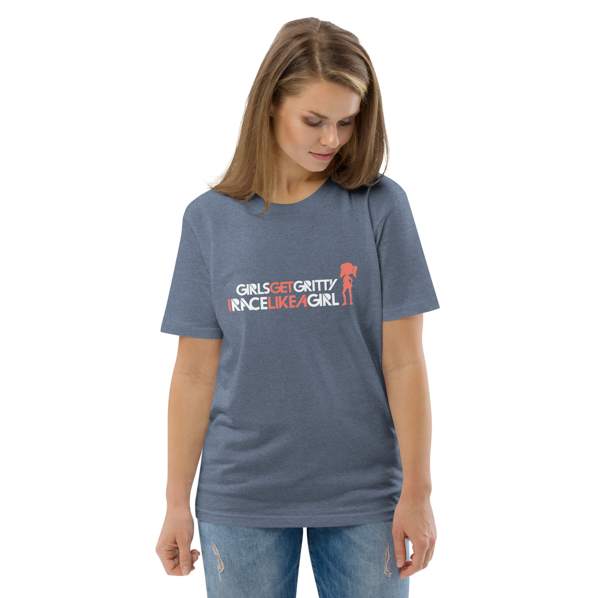 Model wearing the IRACELIKEAGIRL Stanley/Stella Creator unisex tee in Dark Heather Blue with the white and coral GIRLSGETGRITTY IRACELIKEAGIRL logo on the front