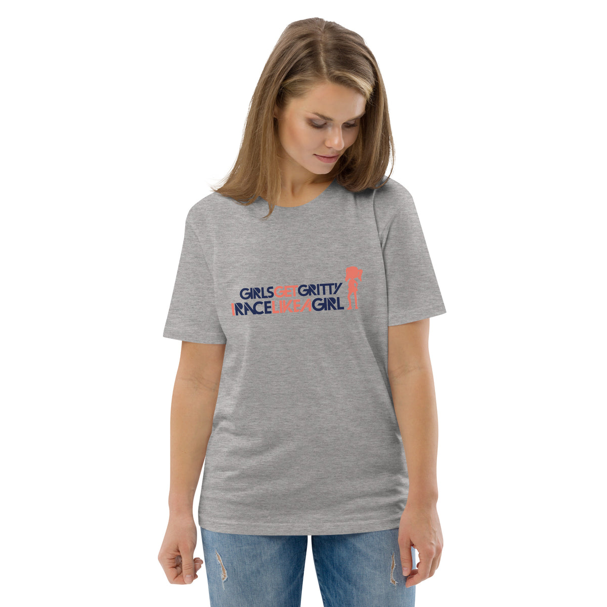 Model wearing the IRACELIKEAGIRL Stanley/Stella Creator unisex tee in Heather Grey with the navy and coral GIRLSGETGRITTY IRACELIKEAGIRL logo on the front