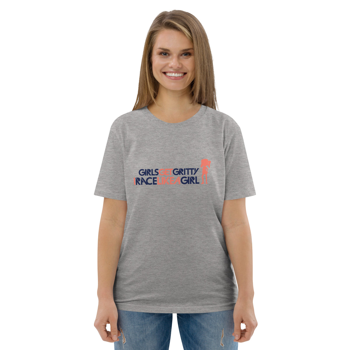 Model wearing the IRACELIKEAGIRL Stanley/Stella Creator unisex tee in Heather Grey with the navy and coral GIRLSGETGRITTY IRACELIKEAGIRL logo on the front