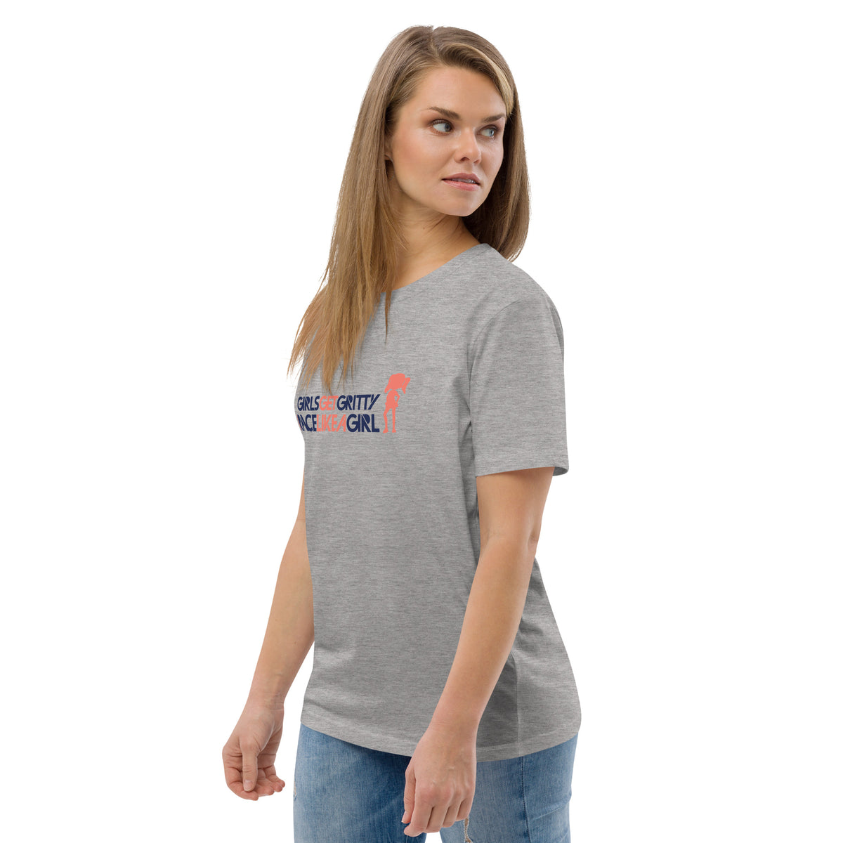 Model wearing the IRACELIKEAGIRL Stanley/Stella Creator unisex tee in Heather Grey with the navy and coral GIRLSGETGRITTY IRACELIKEAGIRL logo on the front